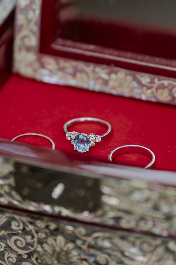 A wedding ring in an ornate Korean box.