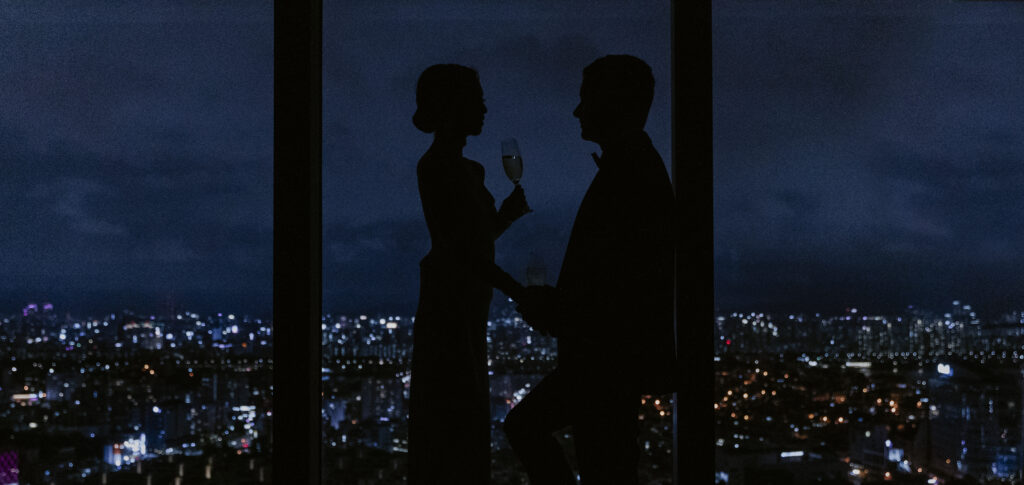 A silhouette of newlyweds celebrating their wedding night in Seoul.