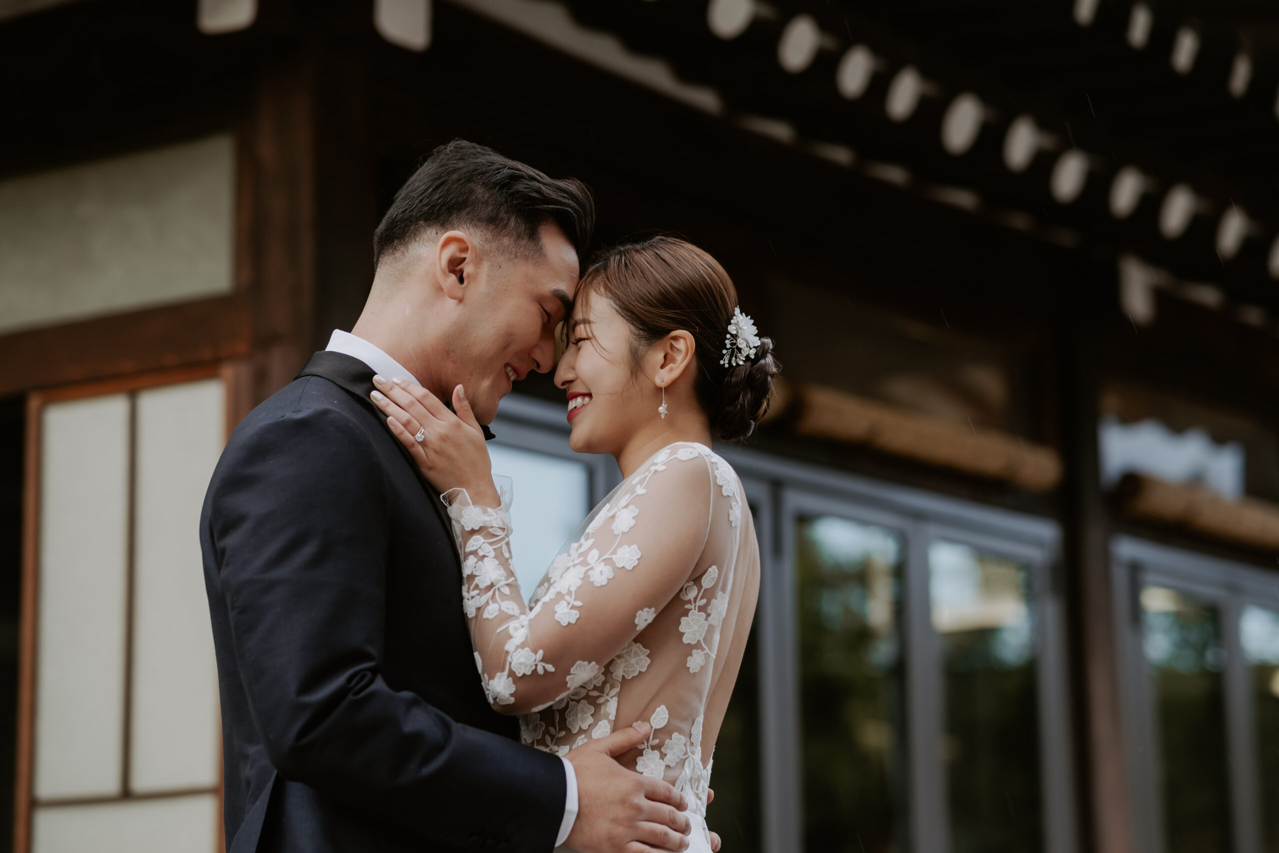 A bride and groom celebrate their wedding at a hanok house venue in Seoul