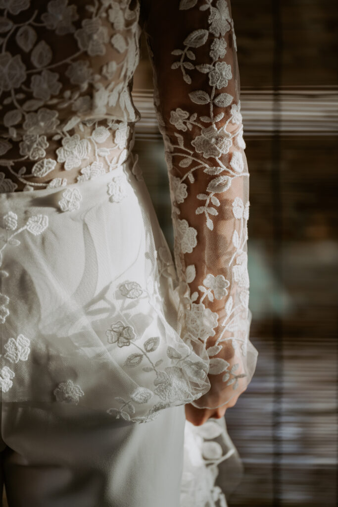 Details of the bride's reception wedding jumpsuit in Seoul.
